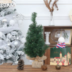 Pine needle Christmas tree decoration with red and black checkered base displayed on window sill, holiday home accent