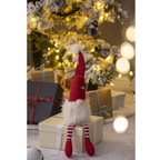 Red and white Christmas gnome ornament with fluffy texture and whimsical design