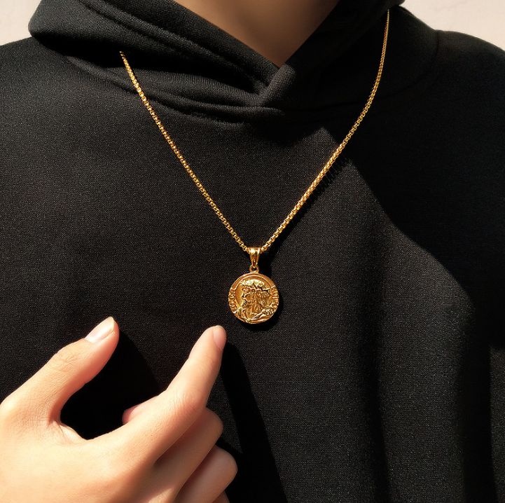 Jesus Christ pendant collection view showing gold and silver options