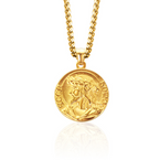Close-up view of Jesus Christ pendant charm detail in gold tone