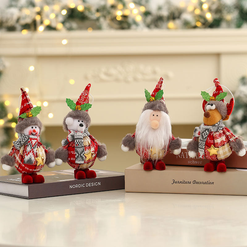 A collection of festive standing doll figurines in various designs for Christmas display