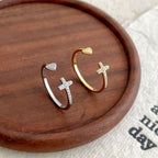 Gold-plated sterling silver ring with cross and heart design
