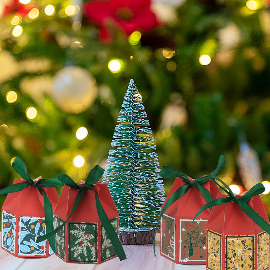 Blue Christmas paper treat box featuring tree and bell festive pattern with ribbon bow detail