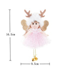 Christmas angel pendant accessory on soft holiday textile background
