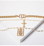 Close-up detail of embossed Jesus motif on vintage double ring