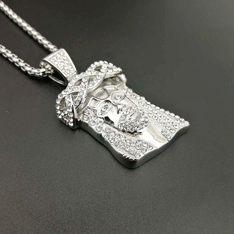 Detailed Jesus figure pendant in gold finish on steel chain