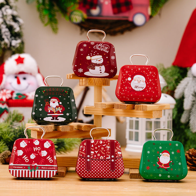 Six tinplate handbag candy box designs arranged for Christmas decor