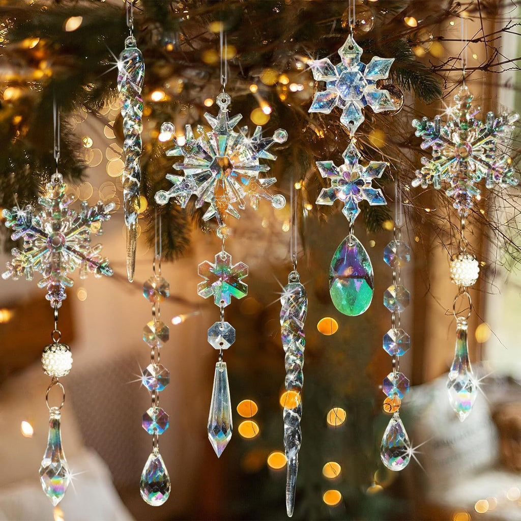 Crystal snowflake pendants catching light against dark background