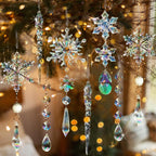 Crystal snowflake pendants catching light against dark background