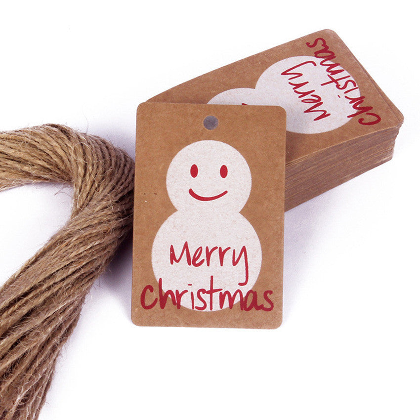 Assorted kraft paper Christmas tags featuring festive motifs for gifting
