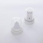 Wooden cottage-style Christmas ornament with soft inner glow