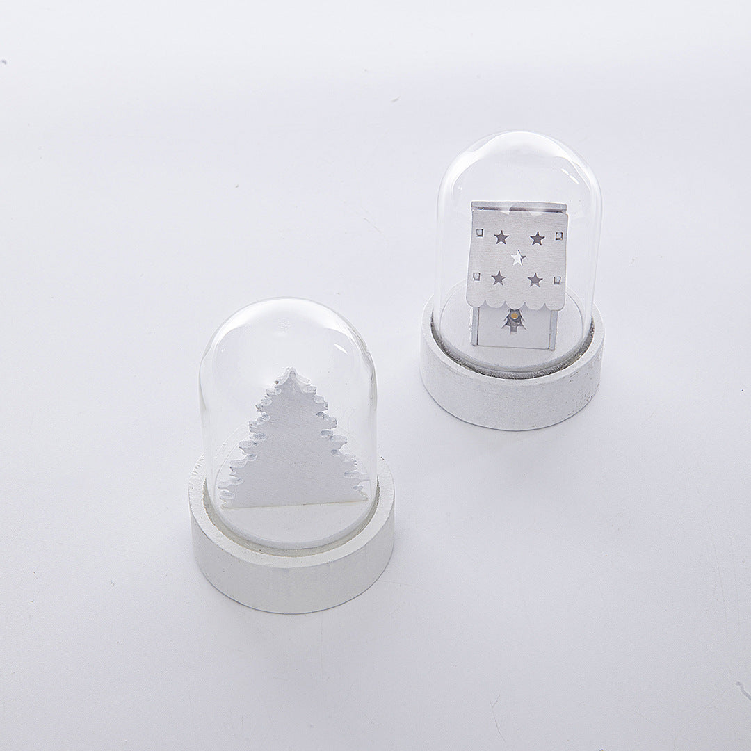 Wooden cottage-style Christmas ornament with soft inner glow