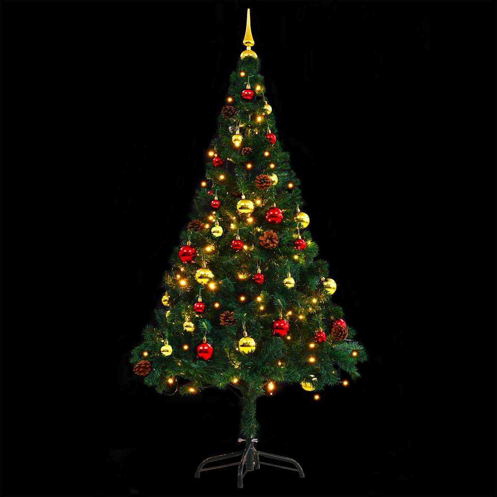 Illuminated artificial Christmas tree with colorful baubles creating warm holiday atmosphere