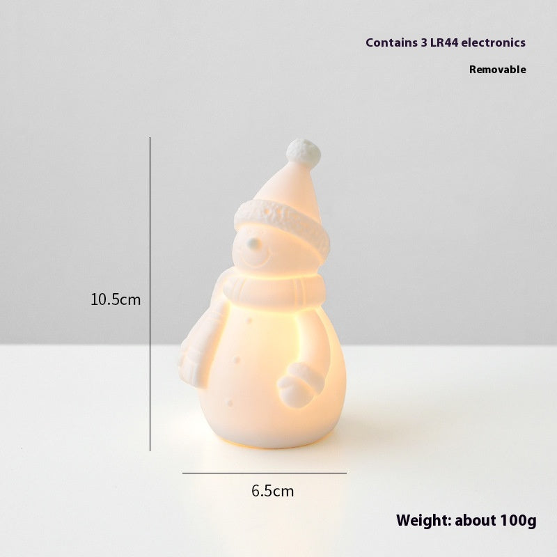 Christmas snowman ornament in ceramic with classic holiday styling