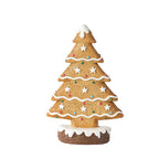 Festive gingerbread tree decoration bringing cozy Christmas spirit to living space