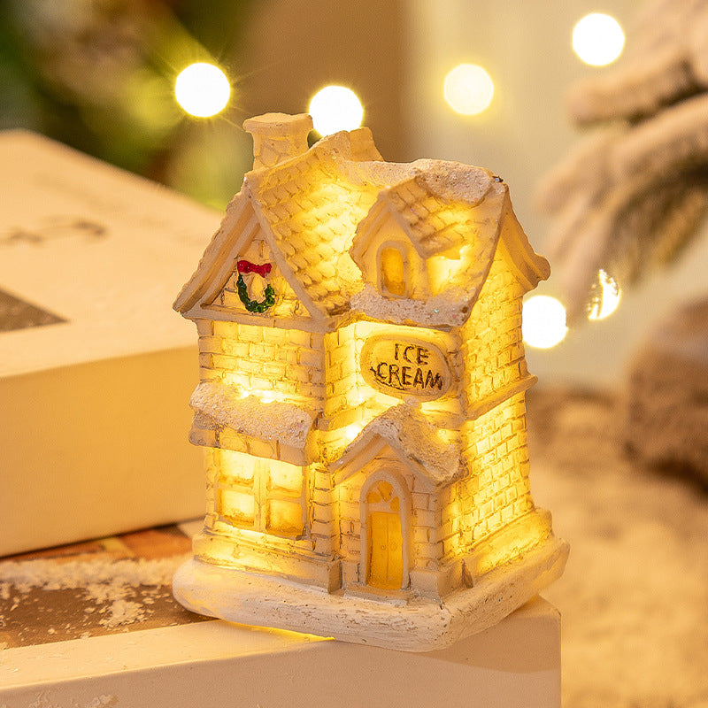 White resin small house Christmas decor close up detail