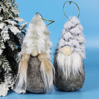 Plush Christmas figures arranged for festive window scene