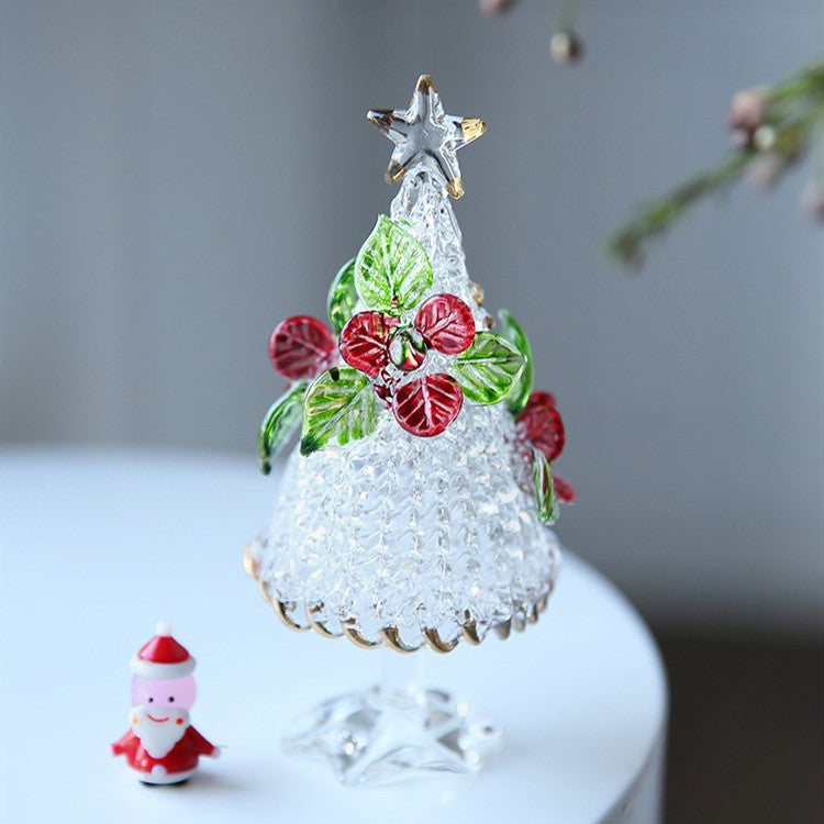Handmade glass decoration featuring Christmas tree with red blooms