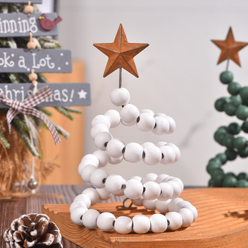 Wooden Christmas tree ornaments with wrought iron accents