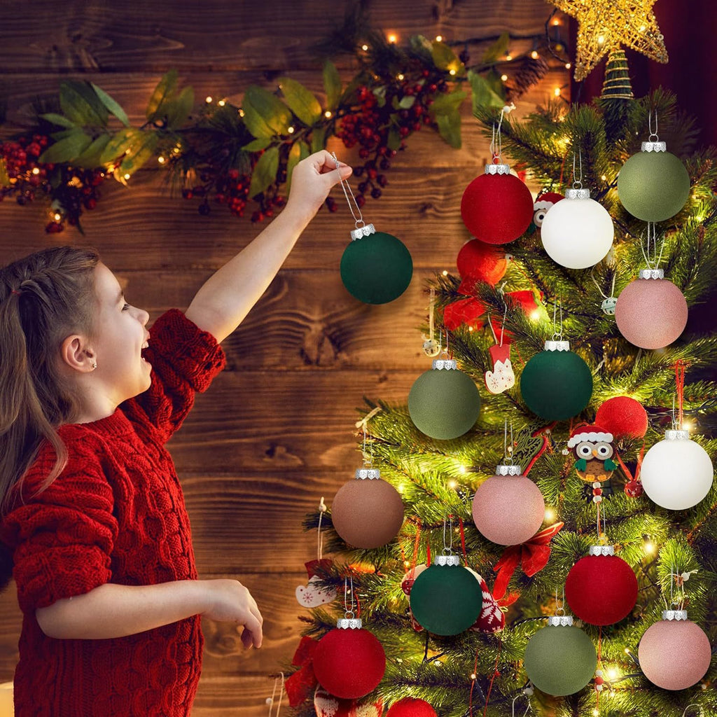 Christmas tree adorned with plucked silk ball ornaments and festive decorations