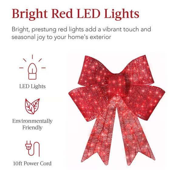 Festive illuminated bowknot in rich red satin for Christmas decorating