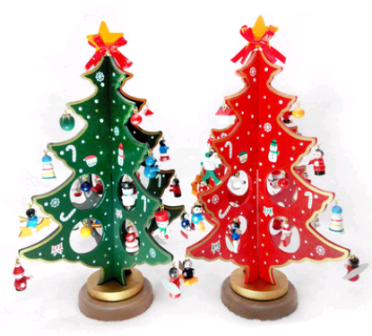 Handcrafted wood Christmas tree ornament displayed on rustic shelf