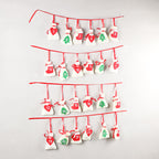 Set of three colorful felt Christmas hanging bags displayed together