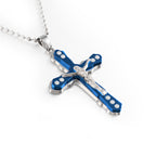 Close-up of the cross pendant detail and electroplated finish