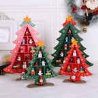 Set of wooden Christmas tree scene ornaments arranged for seasonal display
