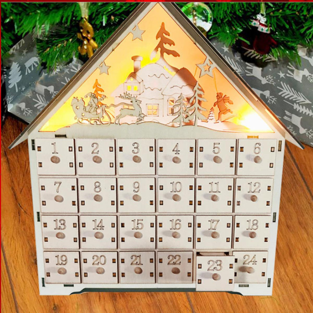 Ornate wooden Advent calendar cabinet with carved details on drawer fronts