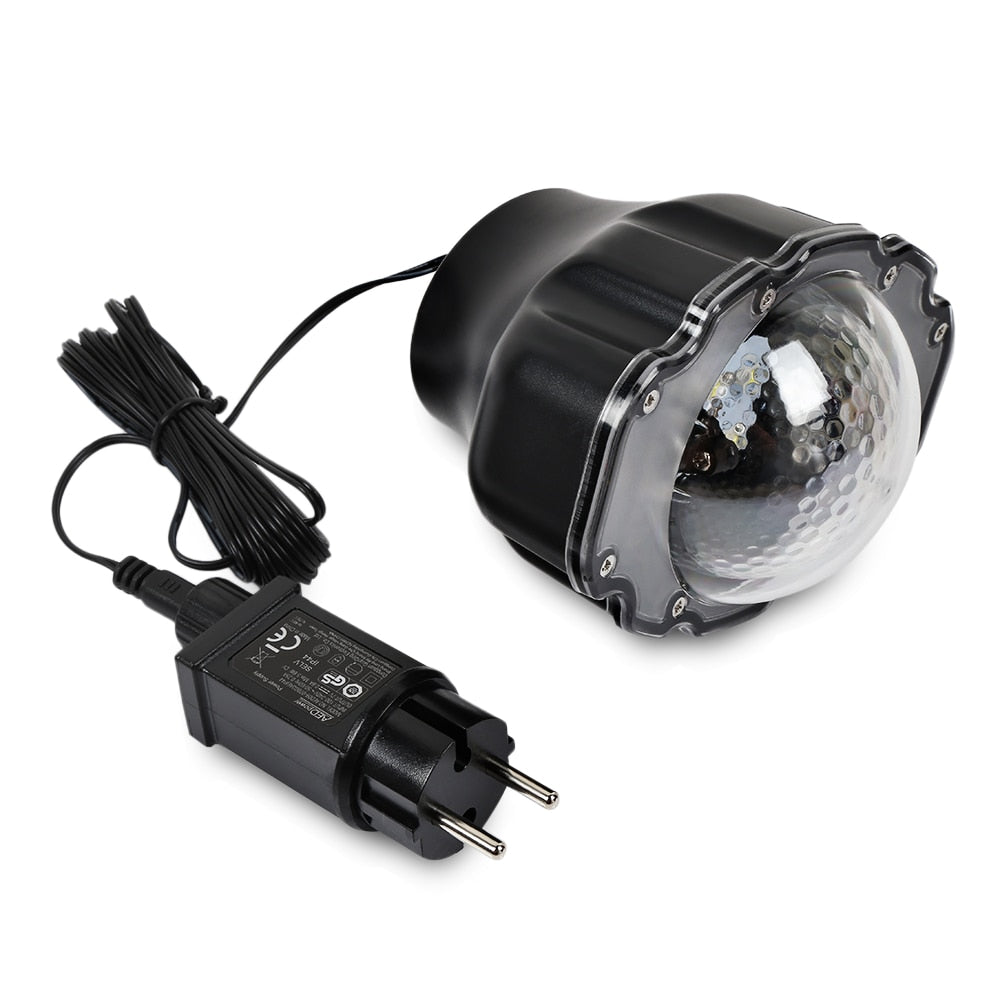 LED Snowfall Christmas Projector Light festive holiday setup with glowing snowflakes