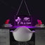 Jesus Christ portrait LED neon light with cross design glowing warmly on dark background