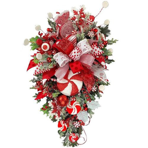 Colorful Christmas wreath with decorative bell elements in festive setting