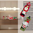 Set of two Christmas wine bottle dress-up covers in coordinating holiday designs