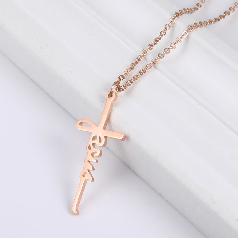 Steel colored Jesus cross pendant necklace on model