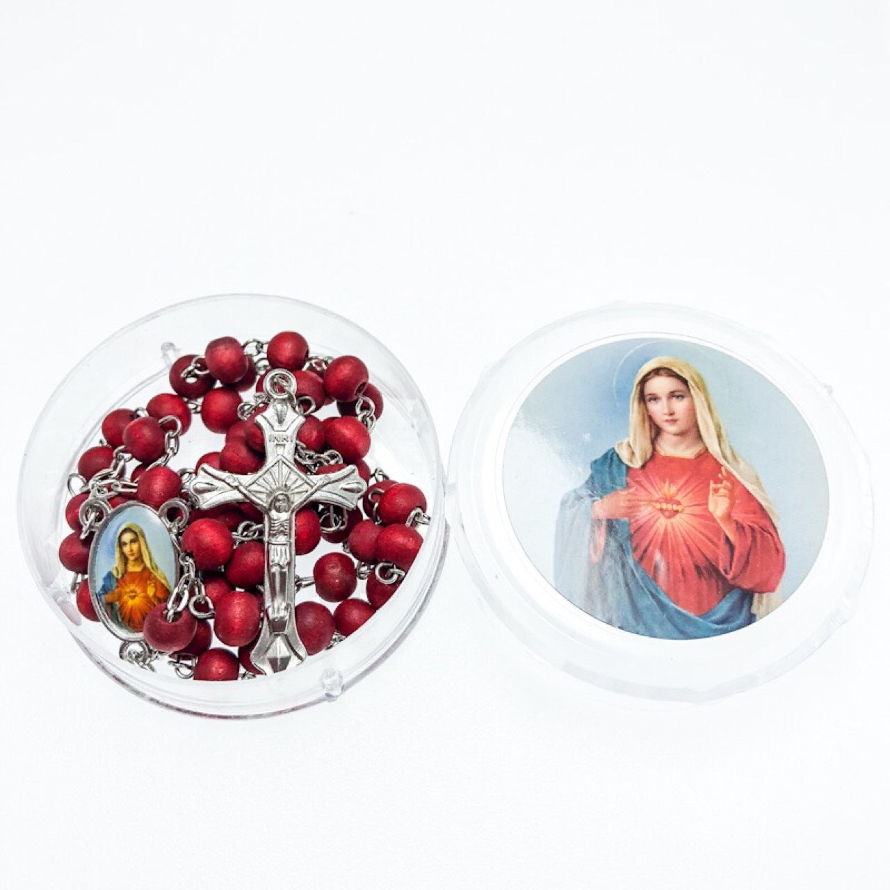 Wooden rosary necklace displayed against soft fabric