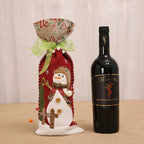Set of fabric wine bottle covers in snowman deer and old man styles for gifting