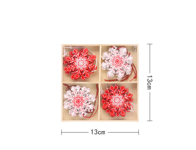 Set of wooden Christmas ornaments hanging together showing multiple design variants
