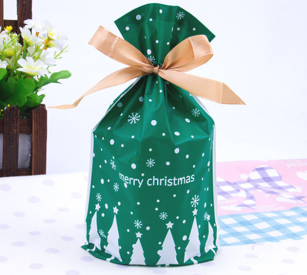 Christmas drawstring bag laid flat showing dimensions