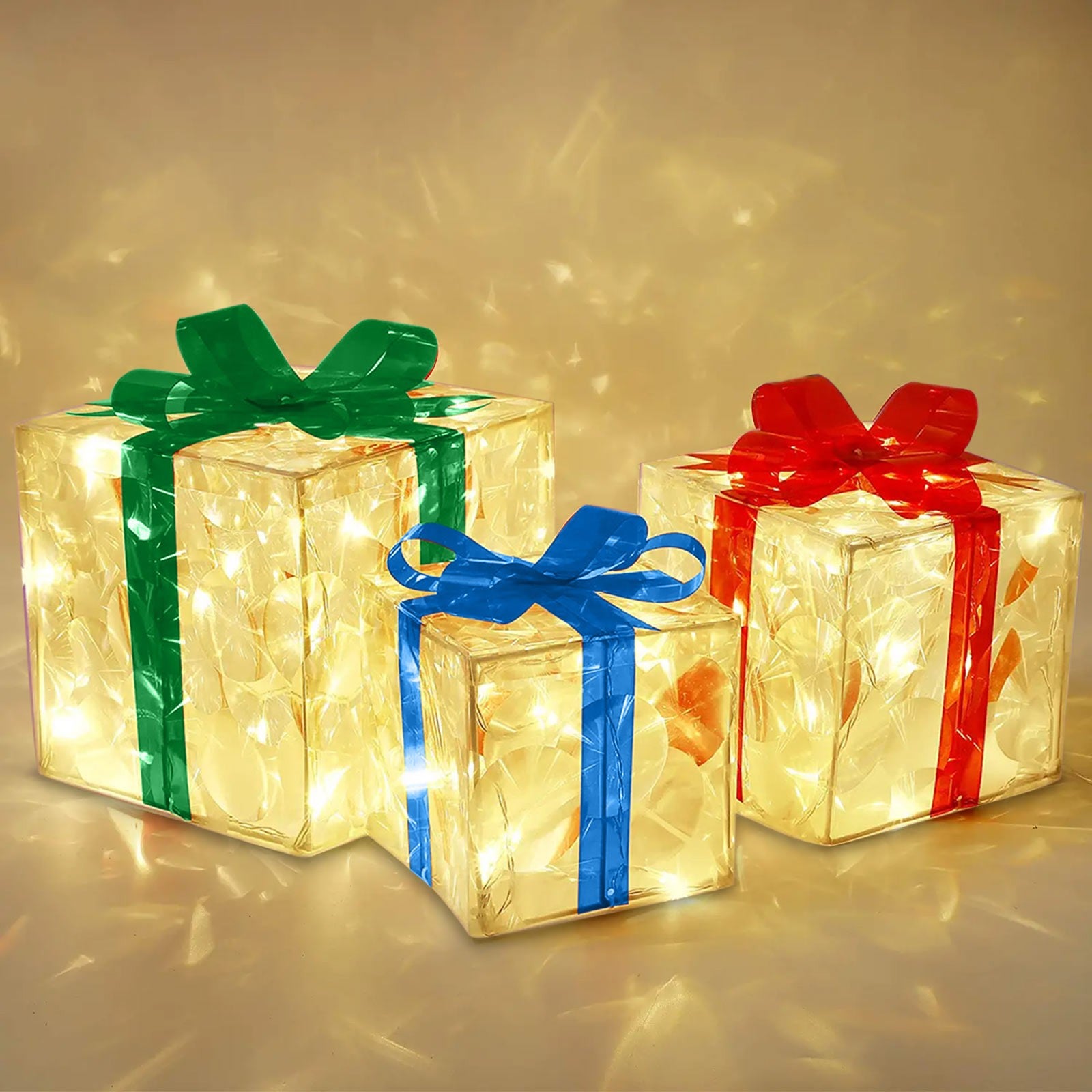 Decorative Christmas gift box with red bow and warm glowing lights