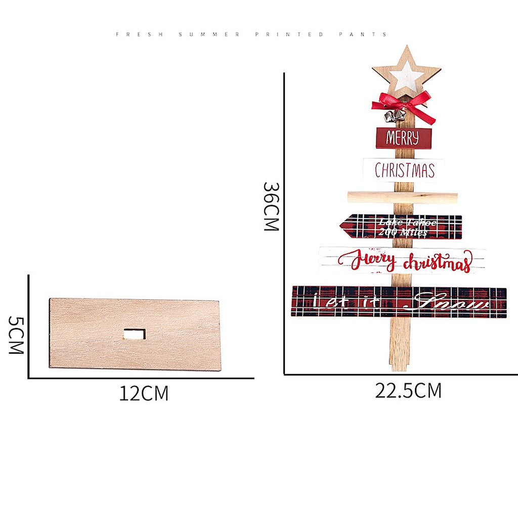 Close-up of wooden Christmas tree decor featuring holiday letters and pine silhouette