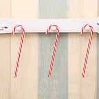 Christmas holiday candy cane pendant decorations in red and white