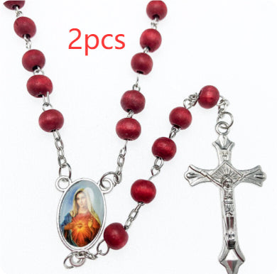 Multiple wooden rosary necklaces showing variant colors