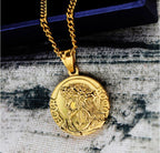 Jesus pendant necklace in gold-tone finish with chain laid flat