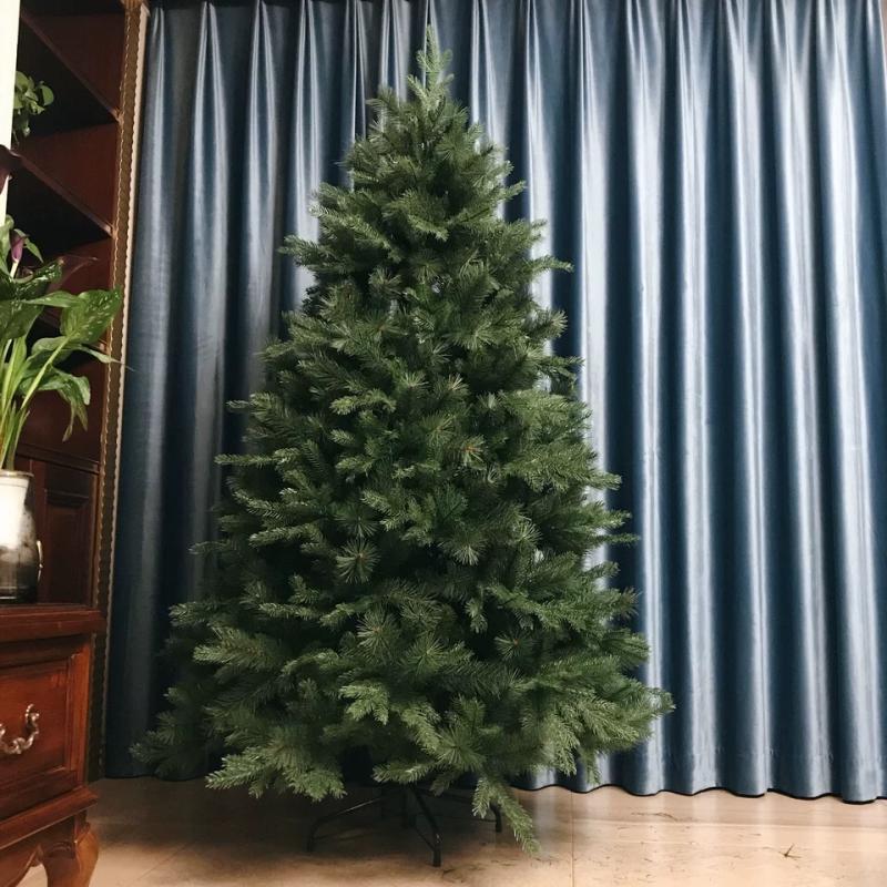 Green PE pine needle Christmas tree with natural texture and full branches for home decoration Main image