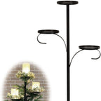 Classic wrought iron Christmas candlestick standing alone as festive centerpiece