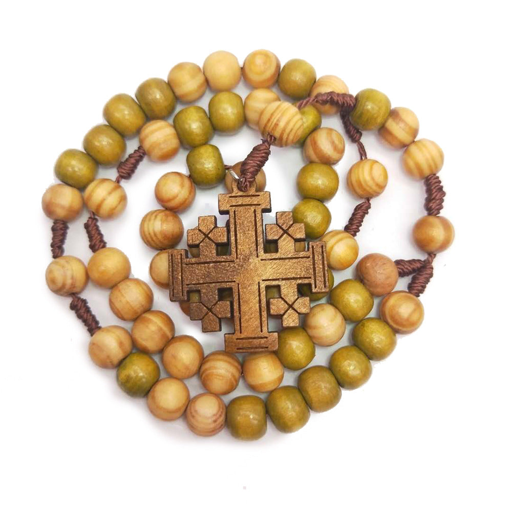 Rosary necklace laid flat showing crucifix and bead chain