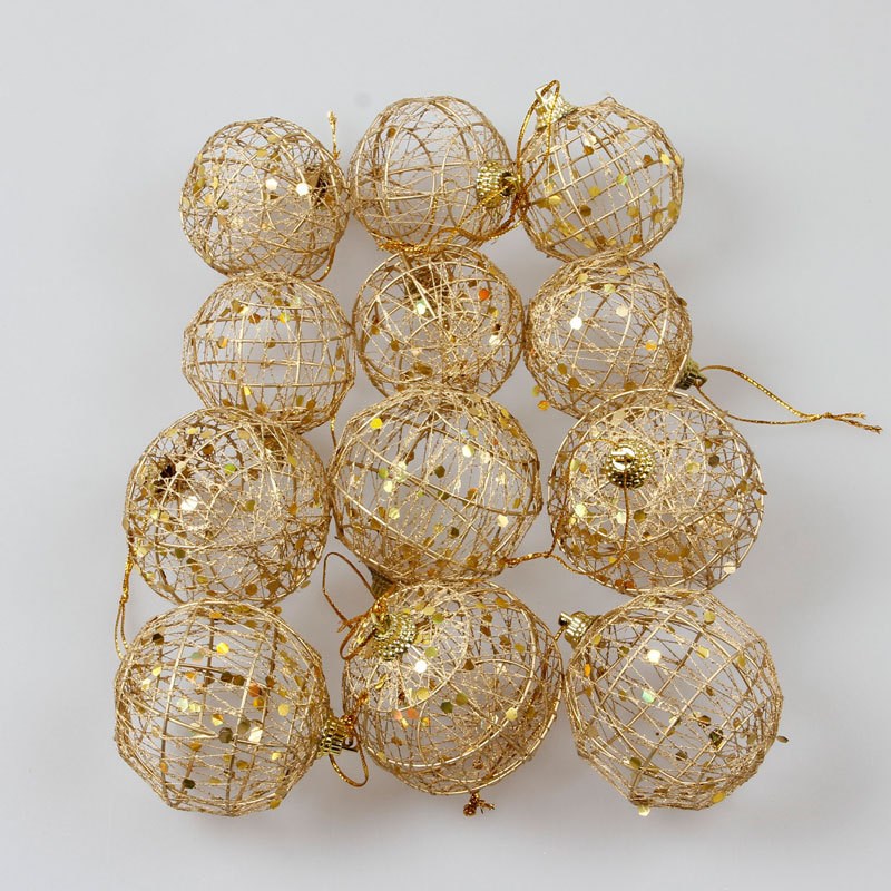 Multiple gold-tone scaly Christmas ornaments showcasing holiday ornament set quality