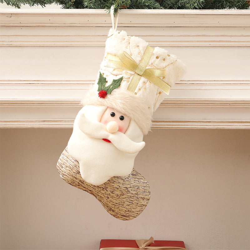 White fabric Christmas stocking in Nordic style ready for holiday mantel display