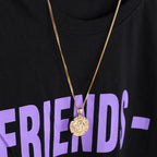 Gold chain necklace featuring Jesus religious portrait pendant